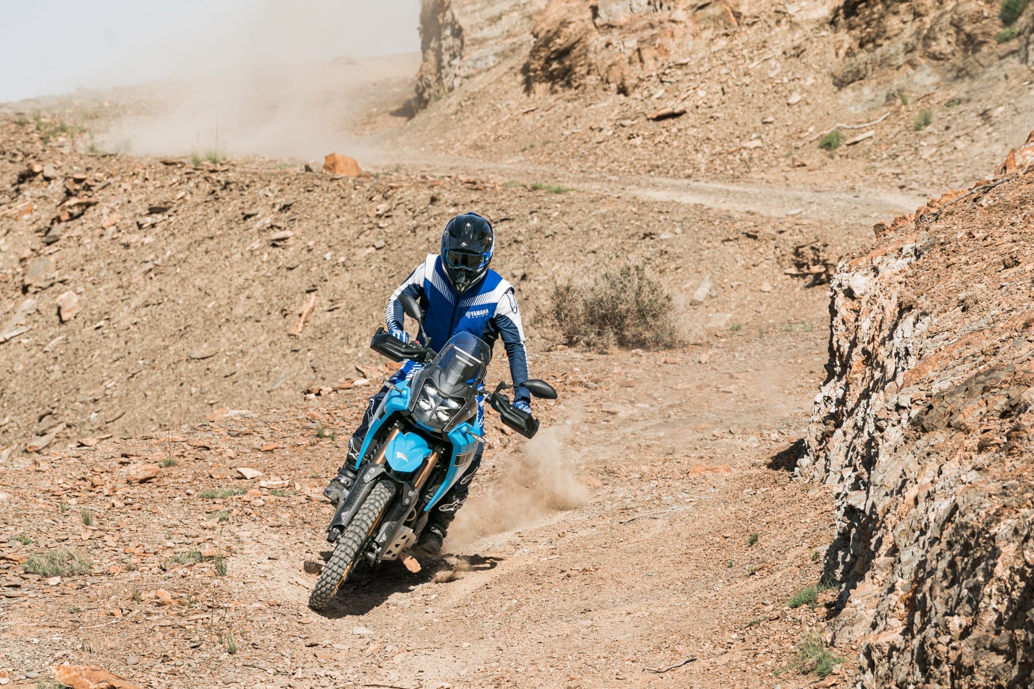 Yamaha Ténéré 700 climbing a rocky gully in the Agafay desert